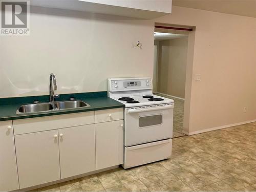 2454 75Th Avenue, Grand Forks, BC - Indoor Photo Showing Kitchen With Double Sink