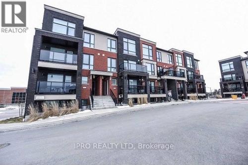 10 - 100 Dufay Road, Brampton, ON - Outdoor With Facade