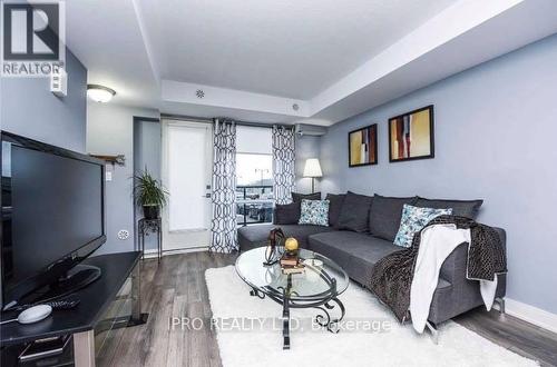 10 - 100 Dufay Road, Brampton, ON - Indoor Photo Showing Living Room