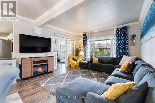 49 Connaught Avenue N, Hamilton, ON - Indoor Photo Showing Living Room With Fireplace