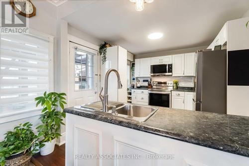 49 Connaught Avenue N, Hamilton, ON - Indoor Photo Showing Kitchen With Double Sink