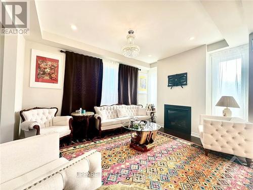 700 Brittanic Road, Ottawa, ON - Indoor Photo Showing Living Room With Fireplace