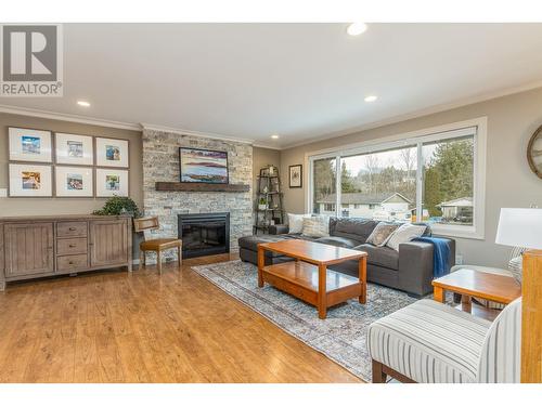 2291 21 Street Ne, Salmon Arm, BC - Indoor Photo Showing Living Room With Fireplace