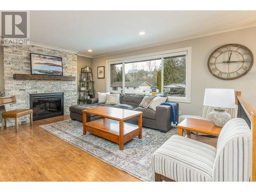 2291 21 Street Ne, Salmon Arm, BC - Indoor Photo Showing Living Room With Fireplace