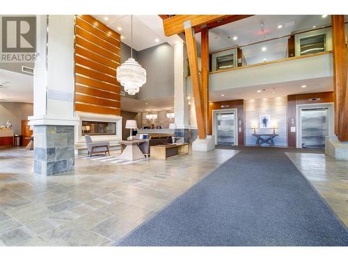 2950 Camozzi Road Unit# 1413, Revelstoke, BC - Indoor Photo Showing Other Room With Fireplace