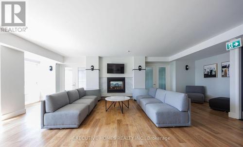 1150 - 313 Richmond Street E, Toronto, ON - Indoor Photo Showing Living Room With Fireplace