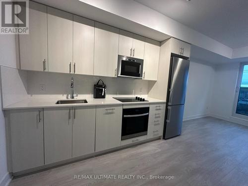 409 - 2545 Simcoe Street N, Oshawa, ON - Indoor Photo Showing Kitchen With Stainless Steel Kitchen