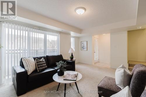 109 - 5035 Oscar Peterson Boulevard, Mississauga, ON - Indoor Photo Showing Living Room