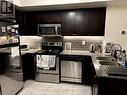 255 - 35 Elsie Lane, Toronto, ON  - Indoor Photo Showing Kitchen With Double Sink With Upgraded Kitchen 