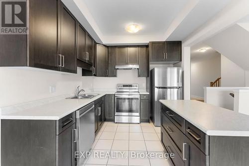 102 - 4552 Portage Road, Niagara Falls (211 - Cherrywood), ON - Indoor Photo Showing Kitchen With Double Sink