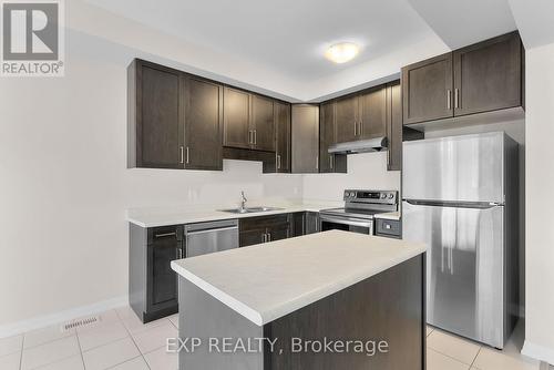 102 - 4552 Portage Road, Niagara Falls (211 - Cherrywood), ON - Indoor Photo Showing Kitchen With Double Sink