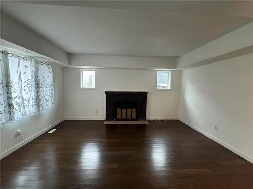 321 Arlington Street, Winnipeg, MB - Indoor Photo Showing Living Room With Fireplace