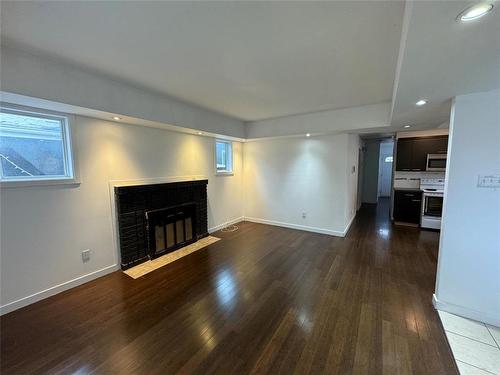 321 Arlington Street, Winnipeg, MB - Indoor Photo Showing Other Room With Fireplace