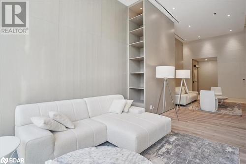 Living room featuring hardwood / wood-style flooring - 370 Martha Street Unit# 2104, Burlington, ON - Indoor