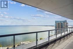 Balcony featuring a water view - 