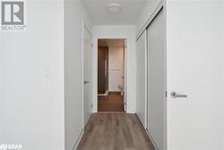 Corridor featuring light hardwood / wood-style flooring - 