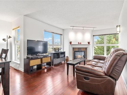 306-1201 Hillside Ave, Victoria, BC - Indoor Photo Showing Living Room With Fireplace