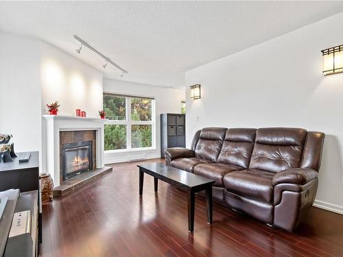 306-1201 Hillside Ave, Victoria, BC - Indoor Photo Showing Living Room With Fireplace