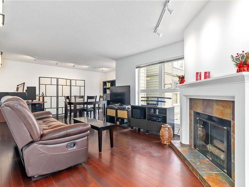 306-1201 Hillside Ave, Victoria, BC - Indoor Photo Showing Living Room With Fireplace