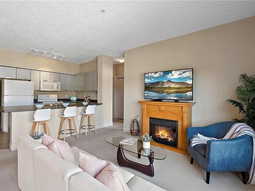 419-870 Short St, Saanich, BC - Indoor Photo Showing Living Room With Fireplace