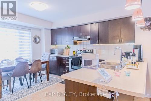 4 - 60 Fairwood Circle, Brampton, ON - Indoor Photo Showing Kitchen With Double Sink