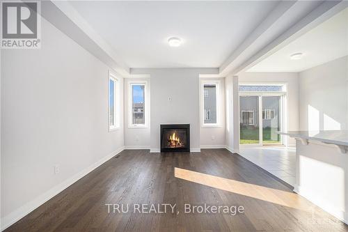 655 Allied Mews, Ottawa, ON - Indoor Photo Showing Living Room With Fireplace