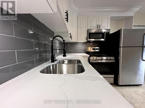 282-286 Queen Street N, Norfolk (Simcoe), ON - Indoor Photo Showing Kitchen With Double Sink