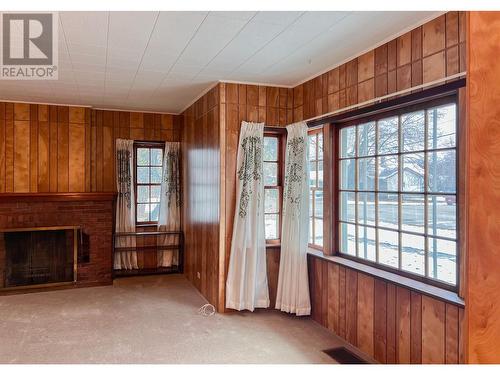 7517 6Th Street, Grand Forks, BC - Indoor Photo Showing Other Room With Fireplace