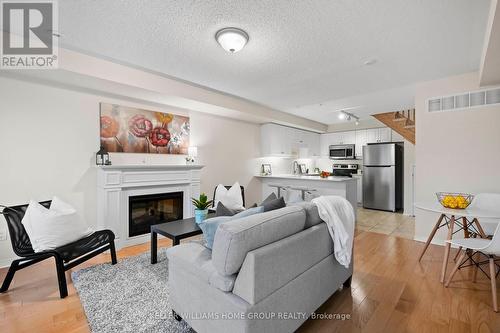 34 - 5 Armstrong Street, Orangeville, ON - Indoor Photo Showing Living Room With Fireplace