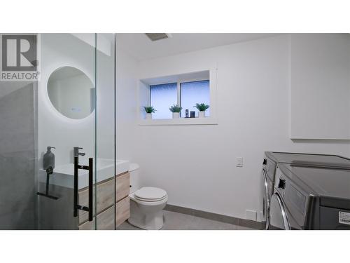 Downstairs Bathroom + Laundry - 935 Mckay Road, West Kelowna, BC - Indoor Photo Showing Other Room