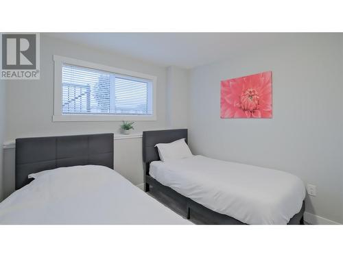 Suite Secondary - 935 Mckay Road, West Kelowna, BC - Indoor Photo Showing Bedroom