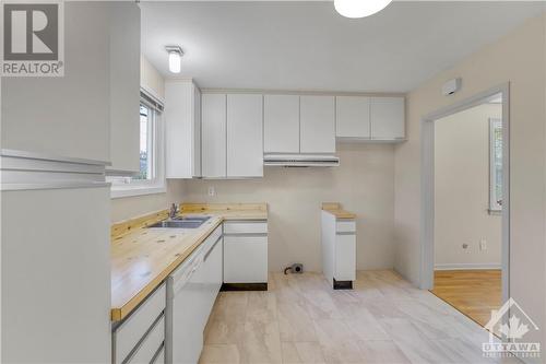 714 Buxton Crescent Unit#A, Ottawa, ON - Indoor Photo Showing Kitchen With Double Sink