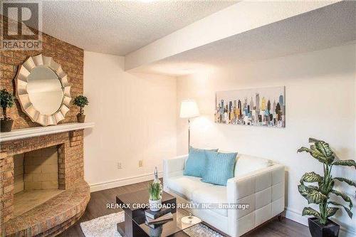 4 Mallingham Court, Toronto, ON - Indoor Photo Showing Living Room With Fireplace