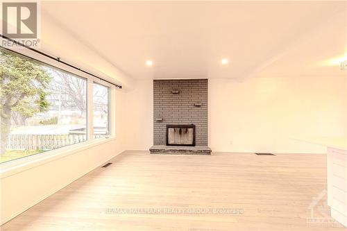 A - 18 Majestic Drive, Ottawa, ON - Indoor With Fireplace