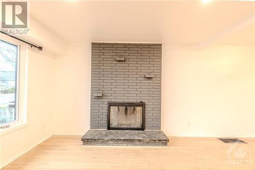 18 Majestic Drive Unit#A, Ottawa, ON - Indoor Photo Showing Living Room With Fireplace