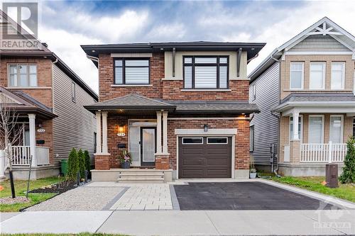 interlock-expanded driveway for additional parking - 734 Brian Good Avenue, Ottawa, ON - Outdoor With Facade