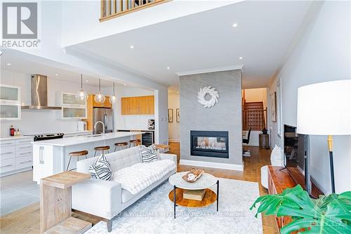 734 Brian Good Avenue, Ottawa, ON - Indoor Photo Showing Living Room With Fireplace