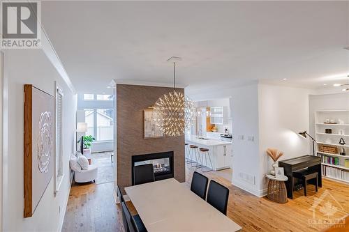 734 Brian Good Avenue, Ottawa, ON - Indoor Photo Showing Dining Room With Fireplace