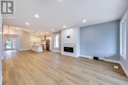 195 Essex Street, Sarnia, ON - Indoor Photo Showing Living Room With Fireplace