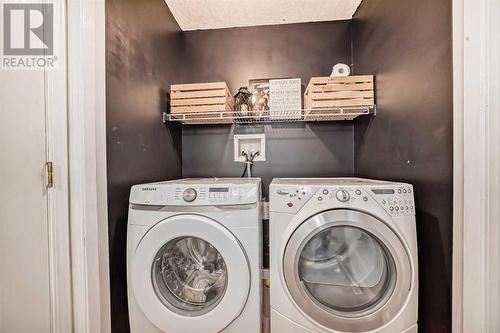 191 Saddleback Road Ne, Calgary, AB - Indoor Photo Showing Laundry Room