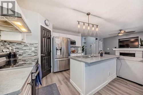 191 Saddleback Road Ne, Calgary, AB - Indoor Photo Showing Kitchen With Stainless Steel Kitchen With Double Sink With Upgraded Kitchen