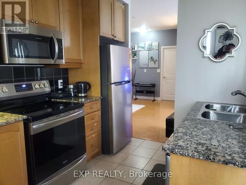 1303 - 80 Absolute Avenue, Mississauga, ON - Indoor Photo Showing Kitchen With Double Sink