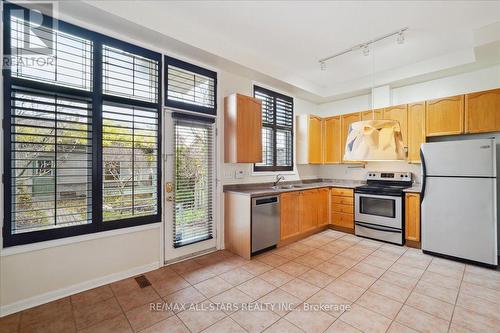 56 Cornell Park Drive, Markham, ON - Indoor Photo Showing Kitchen With Double Sink