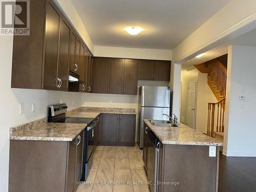 54 - 166 Deerpath Drive, Guelph, ON - Indoor Photo Showing Kitchen With Double Sink