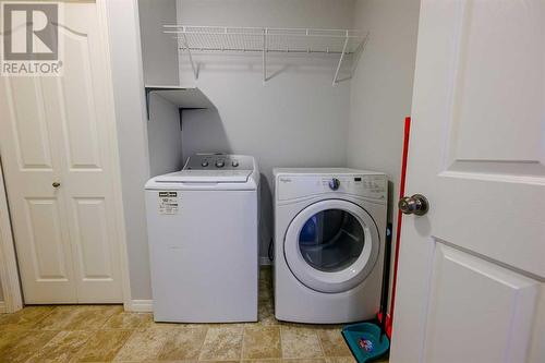 8545 102A Avenue, Grande Prairie, AB - Indoor Photo Showing Laundry Room