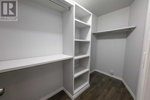 MASTER WALK IN CLOSET - 8545 102A Avenue, Grande Prairie, AB - Indoor With Storage