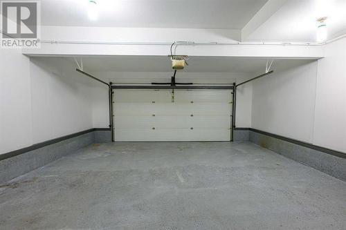 8545 102A Avenue, Grande Prairie, AB - Indoor Photo Showing Garage