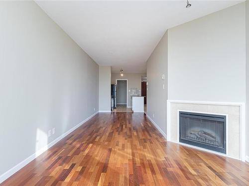 810-160 Wilson St, Victoria, BC - Indoor Photo Showing Living Room With Fireplace