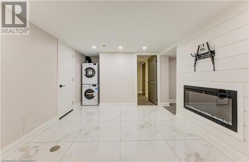 Hallway featuring stacked washer / drying machine - 1100 Union Street Unit# 3, Kitchener, ON - Indoor