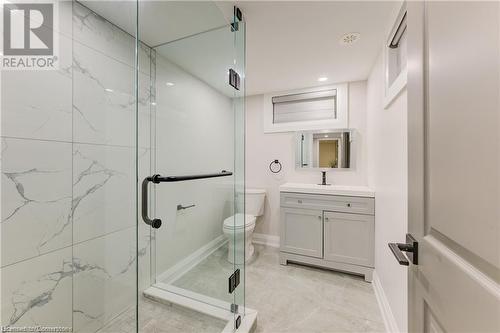 Bathroom featuring vanity, toilet, and walk in shower - 1100 Union Street Unit# 3, Kitchener, ON - Indoor Photo Showing Bathroom